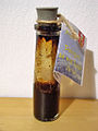 A bottle containing wood tar. A souvenir from the village Losie in Poland.
